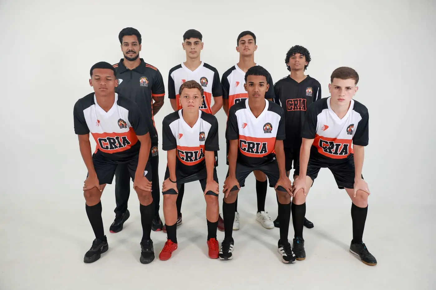 Time de futebol dos Crias com o professor